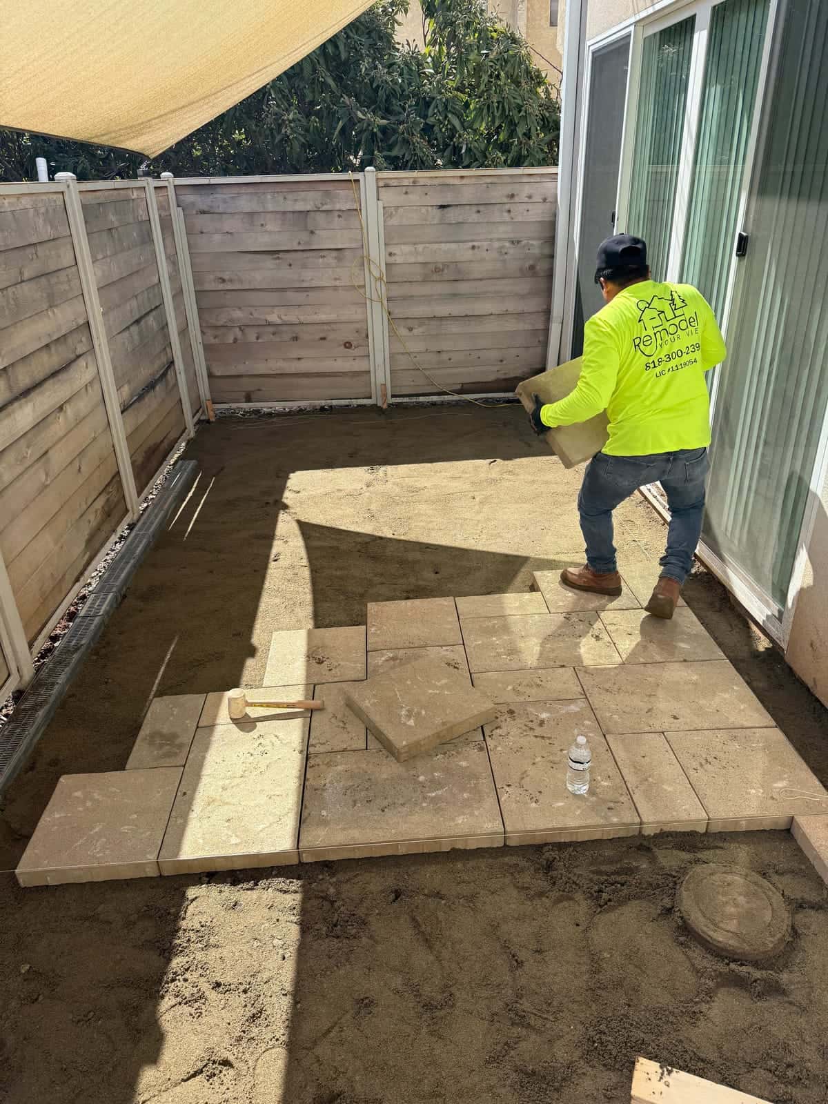 Setting pavers for a side yard patio