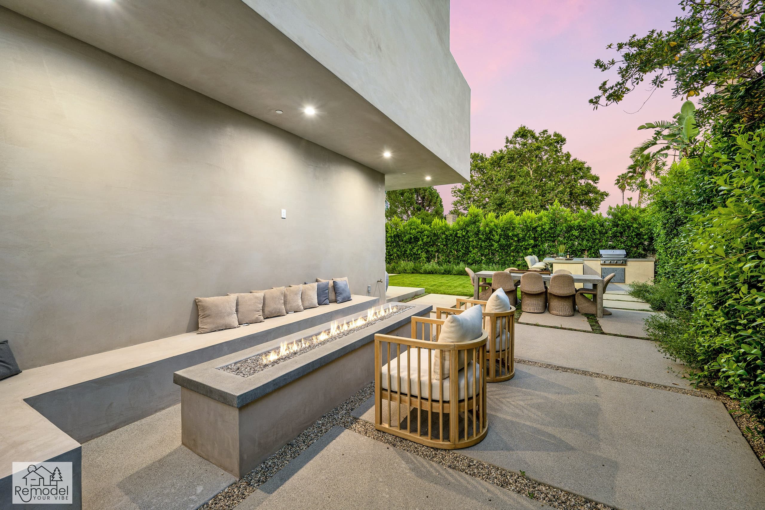 Covered patio with a linear fire table and lounge seating